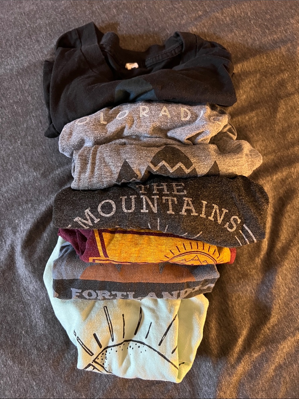 Stack of Coloradical/Fortlandia shirts